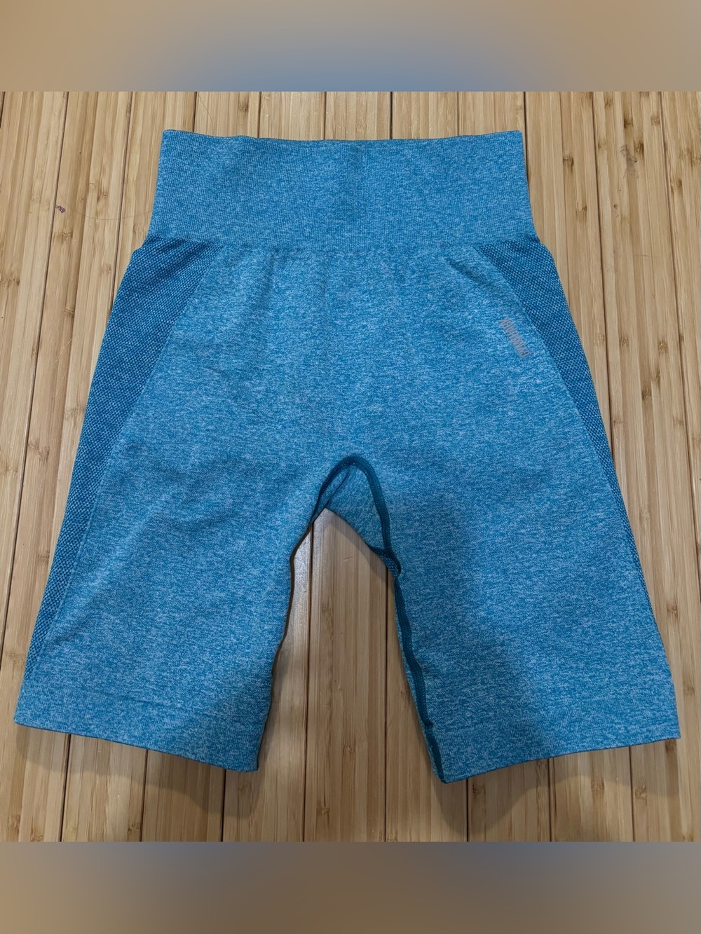 Gymshark bike shorts. No size tag. Measures a size S. EUC. Bright blue.